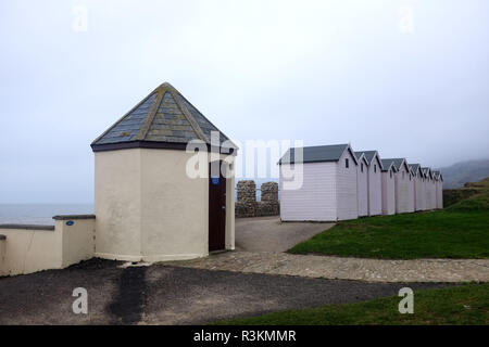 Grade 2 listed lookout building overlooking Jurassic coast beach between Charmouth and Lyme Regis in West Dorset built during the Napoleonic Wars in 1 Stock Photo