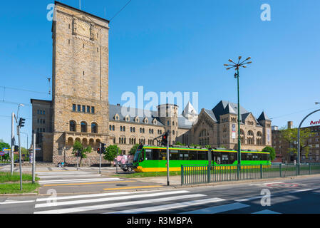 Poznan museum building, view of the Poznan Cultural Centre (Centrum Kultury Zamek) building with a city tram in the foreground, Poland. Stock Photo