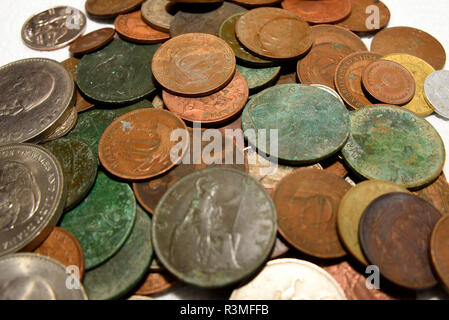 Pile of old vintage British and European coins. Pre decimal. Corroded. Money. Collection. Sterling. Dated coinage Stock Photo