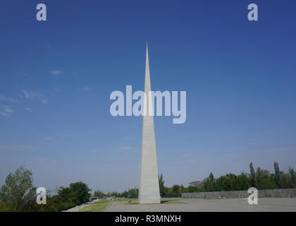 Yerevan Tsitsernakaberd Armenian Genocide Memorial Complex Pillar with Blue Sky Stock Photo