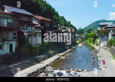 Traditional houses along Yoshida River, Gujo Hachiman, Gifu Prefecture, Japan Stock Photo