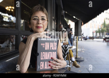 Pilar del Rio poses with the unpublished book by José Saramago, 'The Notebook of the Nobel Year' in Madrid, Spain  Featuring: Pilar del Rio Where: Madrid, Spain When: 23 Oct 2018 Credit: Oscar Gonzalez/WENN.com Stock Photo