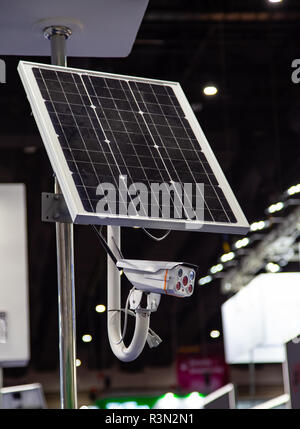 CCTV IP camera with solar cell mounted on pole Stock Photo