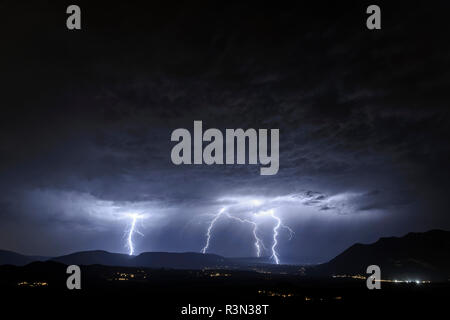 Branched lightning during a very active storm in Bugey, Ain, France, July 30, 2017. Stock Photo
