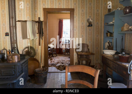 Canada, British Columbia, Barkerville. Interior view of historic cabin ...