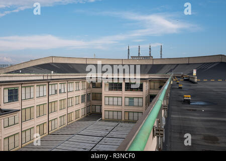 Old Fiat Factory in Turin Italy, built in 1920s, recently renovated by Renzo Piano. On the roof the original test track is open to the public. Stock Photo