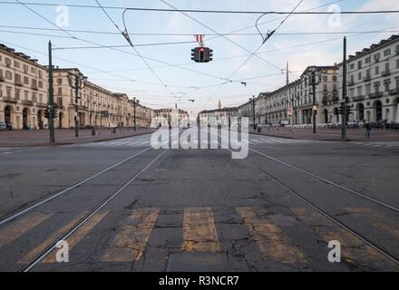 Via Po. Street scene in Turin, Italy with zebra crossing in foreground. Photographed early in the morning. Stock Photo