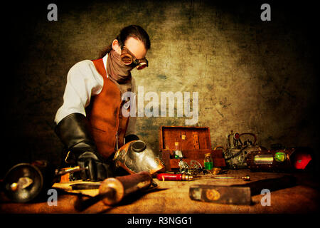 Steampunk man at work Stock Photo