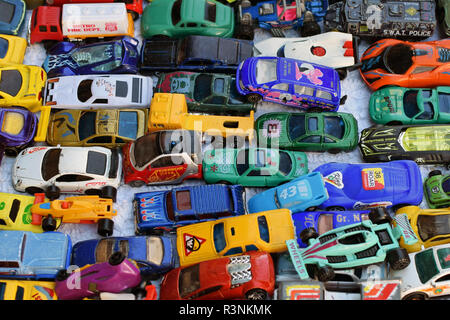 ATHENS, GREECE - OCTOBER 2, 2018: Old toy car collection for sale at street market. Vintage miniature automobile scale model replicas. Stock Photo