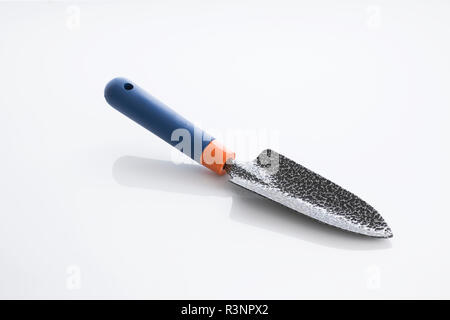Tools: Close up of a Gardening Trowel  Isolated on White Background Shot in Studio. Stock Photo