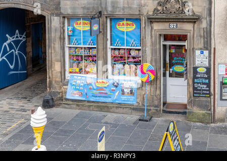 Candy store with colorful shop window downtown in medieval Edinburgh Stock Photo