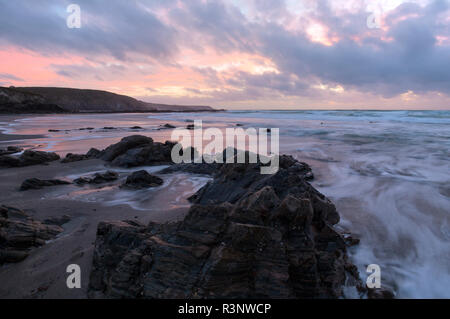Crashing waves on Kennack Sands Beach on the Lizard Coast of Cornwall Stock Photo