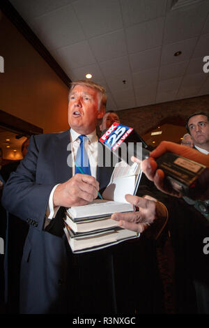 Trump's former lawyer and fixer Michael Cohen together with Donald Trump back when they were buddies. Real Estater and TV Entertainer Donald J. Trump flirting with the idea of running for President in the 2012 Election. One of the many important visits he made was with the Nashua Chamber of Commerce in New Hampshire. Stock Photo