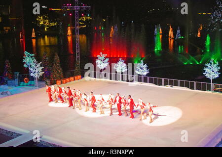 Orlando, Florida. November 21, 2018. Final salute of Professional figure skaters performing on Christmas Ice Show in SeaWorld. Stock Photo