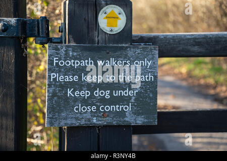 footpath sign on a gate 'walkers only, keep dogs under control'
