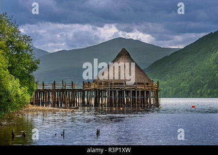 Reconstructed 2500 year old crannog, prehistoric dwelling at the Scottish Crannog Centre on Loch Tay near Kenmore, Perth and Kinross, Scotland, UK Stock Photo