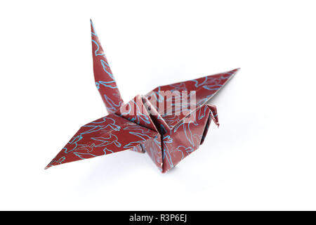 Origami crane isolated on a white background Stock Photo