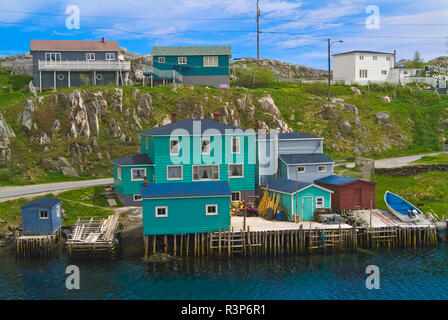 Canada, Newfoundland, Rose Blanche. Colorful houses and boats in coastal village. Stock Photo