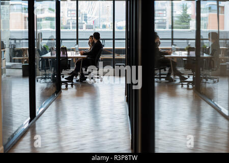 Executives working in office Stock Photo