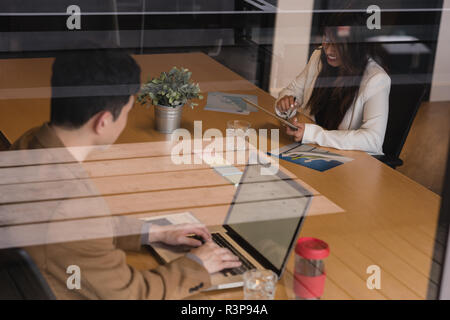 Executives working in office Stock Photo