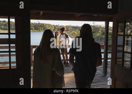 Group of friends having fun in cabin Stock Photo