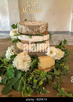 Wedding cake made from wheels of cheese Stock Photo