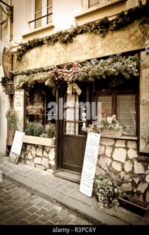 Restaurant Le Poulbot in Montmartre. Paris, France Stock Photo