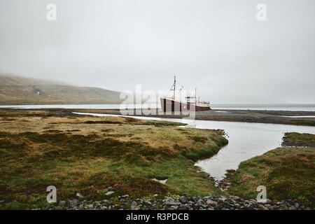 Gardar BA 64 The oldest steel whaling ship in Iceland now beached as a rusting monument in the Westfjords of Iceland. Stock Photo