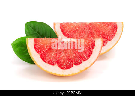 two slices of grapefruit with leaves isolated on white background Stock Photo