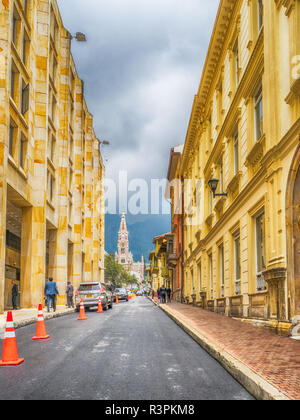 Bogota, Colombia - September 13, 2013: Street of Bogota and view on Santuario Nuestra Senora del Carmen, La Candelaria district. Stock Photo