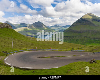 Mountain road leading up to Mount Slaettaratindur, the highest peak in the Faroe islands. Northern Europe, Denmark Stock Photo