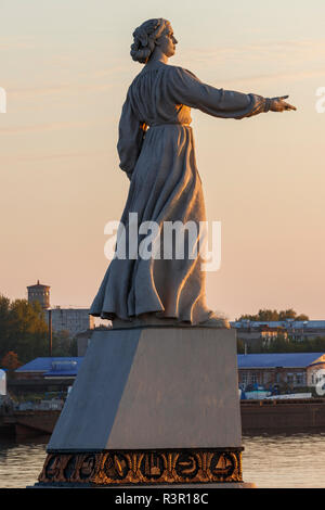 The statue Mother Volga, with hand outstreched in welcome, in the Rybinsk reservoir on the Volga River. Stock Photo