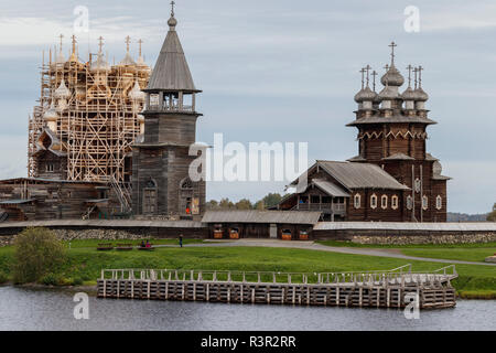 The outdoor museum of Kizhi Island on Lake Onega, Russia. Renovation work taking place on the 1714 22-domed Transfiguration Church. Stock Photo