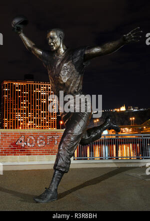 A bronze statue outside PNC Park on Mazeroski Way depicts the likeness of the legendary Pirate second baseman rounding the bases, Pittsburgh, PA, USA Stock Photo