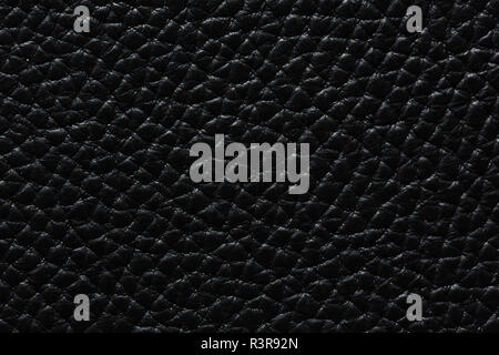 Contrast leather background in black colour. High quality leather texture. Stock Photo