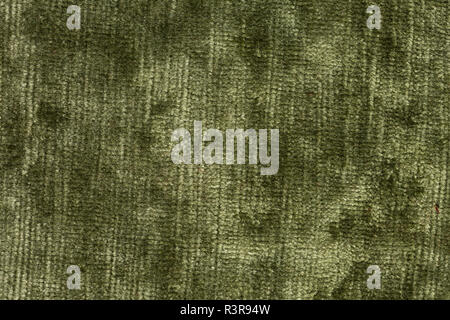 Shiny light green velvet texture on macro. Stock Photo