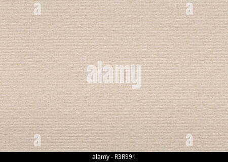 Close up of light beige paper texture, background on macro. Stock Photo