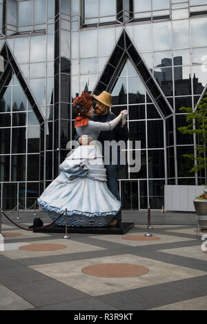 Seward Johnson's sculpture, 'A Turn of the Century,' on display at PPG Place.  The statue, which has been displayed in other cities, is based on an 18 Stock Photo