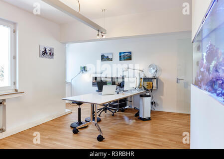 Interior of a modern office with aquarium Stock Photo