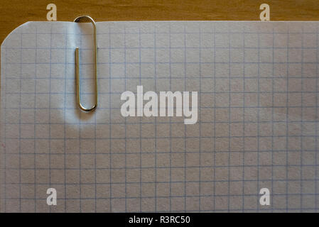 Graph paper with a clip for office work Stock Photo - Alamy