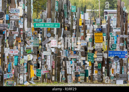 Canada, Yukon, Watson Lake. Jumble of signs and license plates. Stock Photo