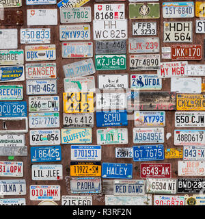 Canada, Yukon, Watson Lake. Auto license plates in The Signpost Forest. Stock Photo