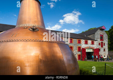 Ireland, County Cork, Midleton, Jameson Irish Whiskey Distillery, massive copper distilling kettle Stock Photo