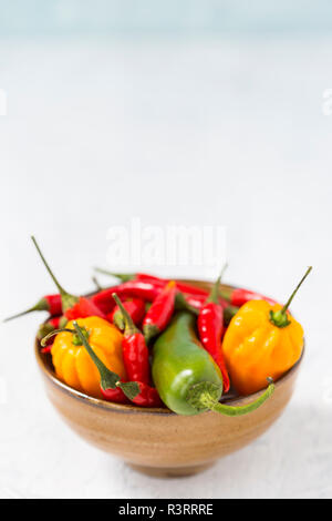 Bowl of various chili pods Stock Photo