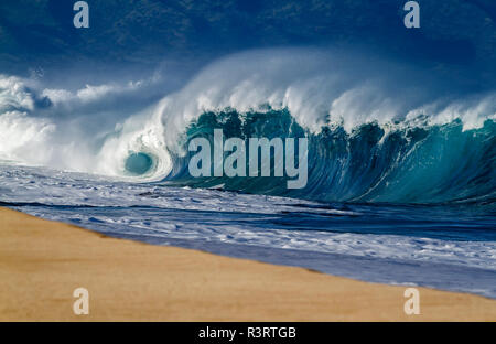 Crashing shore break wave in Hawaii Stock Photo
