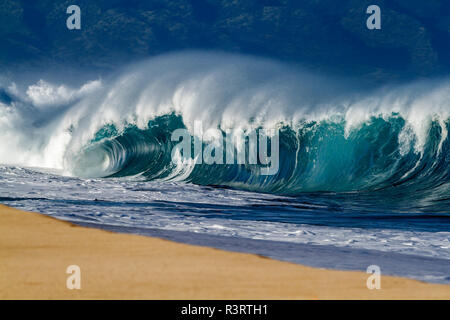 Crashing shore break wave in Hawaii Stock Photo