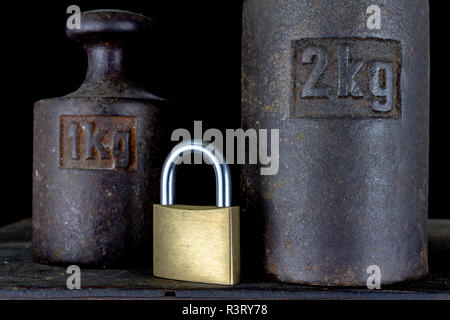 Vintage 5 kilograms calibration iron weight Stock Photo - Alamy