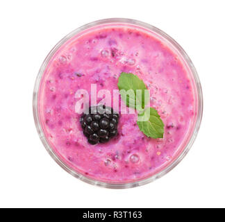 blackberry yogurt or smoothie with mint leaves isolated on white background. Top view. Healthy Eating Stock Photo