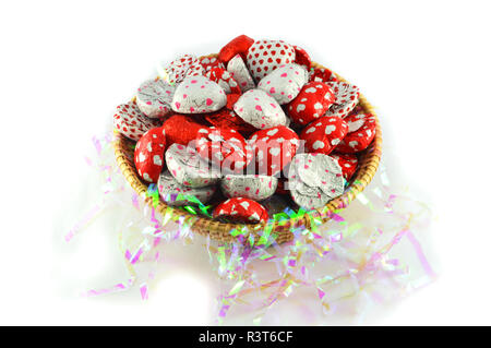 Candy Chocolate heart in Basket on white background isolated Stock Photo