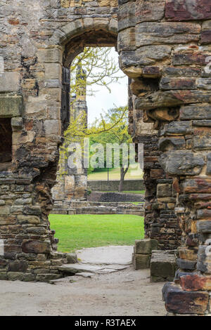 England, West Yorkshire, Leeds, North Bank of river Aire. Kirkstall Abbey, 12th century Cistercian Monastery ruins. Stock Photo